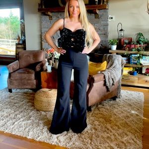 Black jovani jumpsuit with sparkle bows